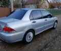 Мицубиси Лансер 2004 в Черновцах на Automoto.ua Серый Мицубиси Лансер, объемом двигателя 1.58 л и пробегом 439 тыс. км за 2750 $, фото 12 на Automoto.ua