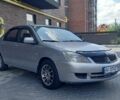 Серый Мицубиси Лансер, объемом двигателя 1.6 л и пробегом 353 тыс. км за 2999 $, фото 1 на Automoto.ua