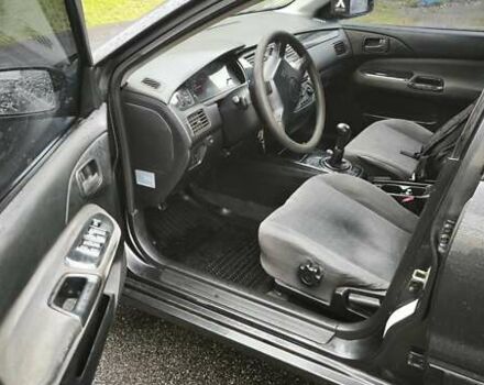 Сірий Міцубісі Lancer, об'ємом двигуна 1.58 л та пробігом 110 тис. км за 2999 $, фото 14 на Automoto.ua