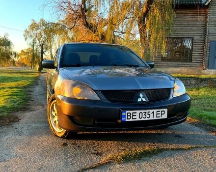 Серый Мицубиси Лансер, объемом двигателя 1.6 л и пробегом 275 тыс. км за 3000 $, фото 1 на Automoto.ua