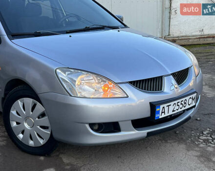 Серый Мицубиси Лансер, объемом двигателя 1.6 л и пробегом 320 тыс. км за 3650 $, фото 7 на Automoto.ua