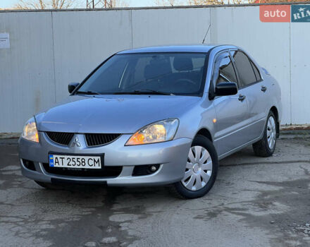 Серый Мицубиси Лансер, объемом двигателя 1.6 л и пробегом 320 тыс. км за 3650 $, фото 11 на Automoto.ua