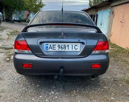 Сірий Міцубісі Lancer, об'ємом двигуна 1.58 л та пробігом 307 тис. км за 3800 $, фото 4 на Automoto.ua