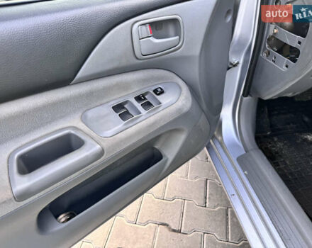 Сірий Міцубісі Lancer, об'ємом двигуна 1.3 л та пробігом 450 тис. км за 2650 $, фото 14 на Automoto.ua