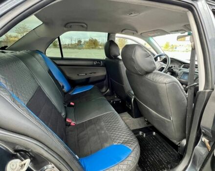 Серый Мицубиси Лансер, объемом двигателя 1.6 л и пробегом 490 тыс. км за 1799 $, фото 13 на Automoto.ua