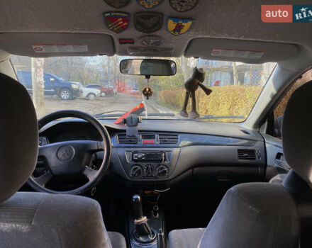 Сірий Міцубісі Lancer, об'ємом двигуна 1.3 л та пробігом 376 тис. км за 3700 $, фото 9 на Automoto.ua