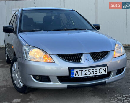 Серый Мицубиси Лансер, объемом двигателя 1.6 л и пробегом 320 тыс. км за 3650 $, фото 8 на Automoto.ua