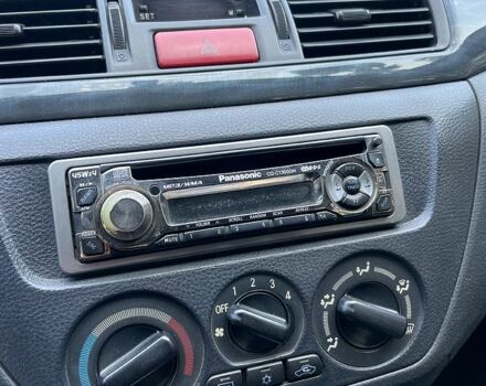 Серый Мицубиси Лансер, объемом двигателя 1.6 л и пробегом 281 тыс. км за 4700 $, фото 8 на Automoto.ua