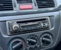 Серый Мицубиси Лансер, объемом двигателя 1.6 л и пробегом 281 тыс. км за 4700 $, фото 8 на Automoto.ua