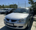 Сірий Міцубісі Lancer, об'ємом двигуна 1.58 л та пробігом 210 тис. км за 3900 $, фото 1 на Automoto.ua