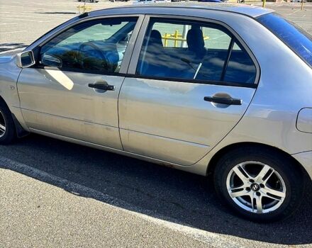 Серый Мицубиси Лансер, объемом двигателя 1.3 л и пробегом 245 тыс. км за 3000 $, фото 7 на Automoto.ua