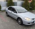 Сірий Міцубісі Lancer, об'ємом двигуна 1.58 л та пробігом 320 тис. км за 3700 $, фото 1 на Automoto.ua