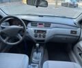 Серый Мицубиси Лансер, объемом двигателя 1.3 л и пробегом 189 тыс. км за 4490 $, фото 17 на Automoto.ua