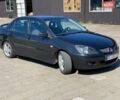Сірий Міцубісі Lancer, об'ємом двигуна 2 л та пробігом 306 тис. км за 4900 $, фото 1 на Automoto.ua