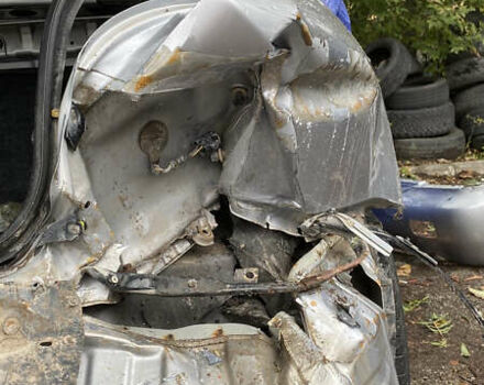 Сірий Міцубісі Lancer, об'ємом двигуна 1.58 л та пробігом 270 тис. км за 1999 $, фото 21 на Automoto.ua