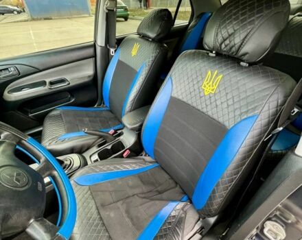 Серый Мицубиси Лансер, объемом двигателя 1.6 л и пробегом 490 тыс. км за 1799 $, фото 9 на Automoto.ua