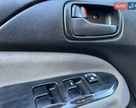 Серый Мицубиси Лансер, объемом двигателя 1.6 л и пробегом 320 тыс. км за 3650 $, фото 35 на Automoto.ua