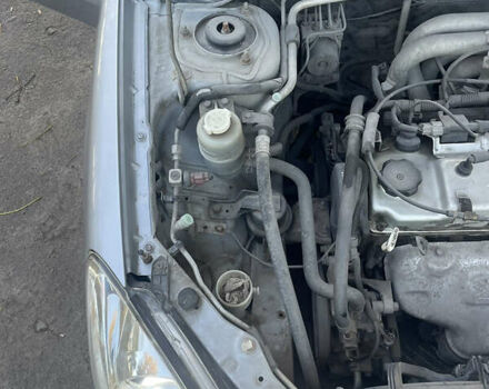 Сірий Міцубісі Lancer, об'ємом двигуна 1.58 л та пробігом 271 тис. км за 3000 $, фото 29 на Automoto.ua