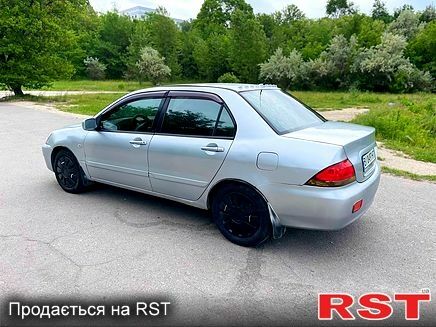 Серый Мицубиси Лансер, объемом двигателя 1.6 л и пробегом 260 тыс. км за 2900 $, фото 4 на Automoto.ua