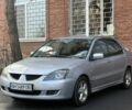 Серый Мицубиси Лансер, объемом двигателя 2 л и пробегом 180 тыс. км за 3700 $, фото 1 на Automoto.ua