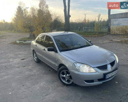 Сірий Міцубісі Lancer, об'ємом двигуна 1.58 л та пробігом 271 тис. км за 3000 $, фото 1 на Automoto.ua