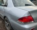 Сірий Міцубісі Lancer, об'ємом двигуна 1.58 л та пробігом 300 тис. км за 3800 $, фото 1 на Automoto.ua