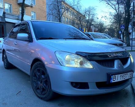 Сірий Міцубісі Lancer, об'ємом двигуна 1.6 л та пробігом 380 тис. км за 4600 $, фото 4 на Automoto.ua