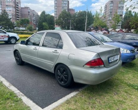 Сірий Міцубісі Lancer, об'ємом двигуна 1.3 л та пробігом 216 тис. км за 2999 $, фото 3 на Automoto.ua