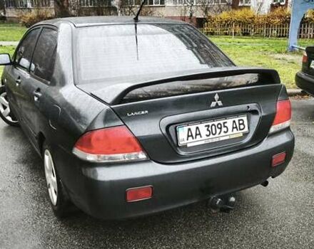 Сірий Міцубісі Lancer, об'ємом двигуна 1.58 л та пробігом 110 тис. км за 2999 $, фото 9 на Automoto.ua