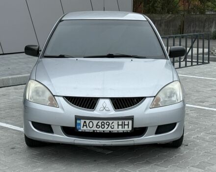 Серый Мицубиси Лансер, объемом двигателя 1.6 л и пробегом 360 тыс. км за 2400 $, фото 1 на Automoto.ua