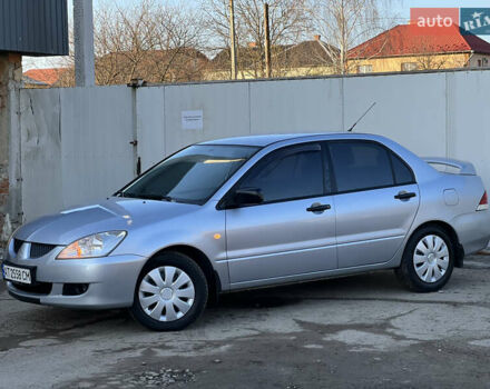 Серый Мицубиси Лансер, объемом двигателя 1.6 л и пробегом 320 тыс. км за 3650 $, фото 14 на Automoto.ua