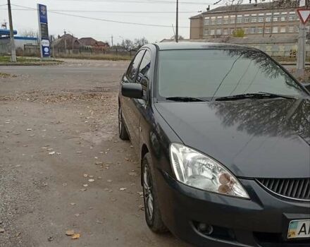 Серый Мицубиси Лансер, объемом двигателя 1.6 л и пробегом 372 тыс. км за 3500 $, фото 7 на Automoto.ua