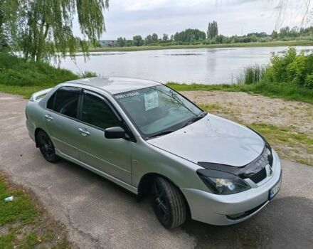 Сірий Міцубісі Lancer, об'ємом двигуна 2 л та пробігом 240 тис. км за 3500 $, фото 4 на Automoto.ua