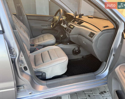 Сірий Міцубісі Lancer, об'ємом двигуна 1.3 л та пробігом 450 тис. км за 2750 $, фото 11 на Automoto.ua