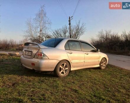 Серый Мицубиси Лансер, объемом двигателя 2 л и пробегом 300 тыс. км за 2850 $, фото 4 на Automoto.ua