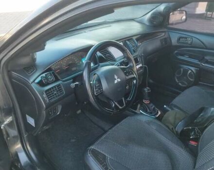 Сірий Міцубісі Lancer, об'ємом двигуна 1.58 л та пробігом 360 тис. км за 4000 $, фото 11 на Automoto.ua