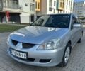 Сірий Міцубісі Lancer, об'ємом двигуна 1.59 л та пробігом 200 тис. км за 1899 $, фото 1 на Automoto.ua