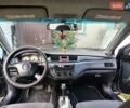 Сірий Міцубісі Lancer, об'ємом двигуна 1.58 л та пробігом 300 тис. км за 4200 $, фото 2 на Automoto.ua