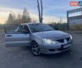 Мицубиси Лансер 2004 в Теофиполь на Automoto.ua Серый Мицубиси Лансер, объемом двигателя 1.58 л и пробегом 270 тыс. км за 3350 $, фото 11 на Automoto.ua