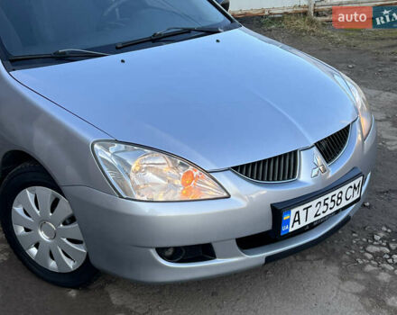 Серый Мицубиси Лансер, объемом двигателя 1.6 л и пробегом 320 тыс. км за 3650 $, фото 9 на Automoto.ua