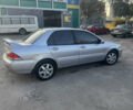 Сірий Міцубісі Lancer, об'ємом двигуна 1.58 л та пробігом 220 тис. км за 4400 $, фото 8 на Automoto.ua