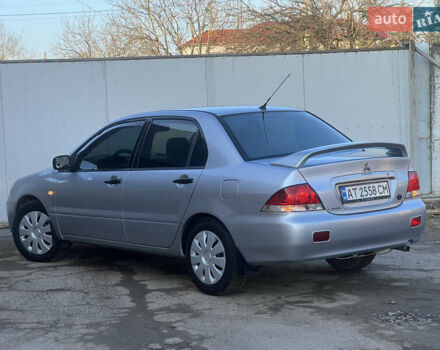 Серый Мицубиси Лансер, объемом двигателя 1.6 л и пробегом 320 тыс. км за 3650 $, фото 18 на Automoto.ua