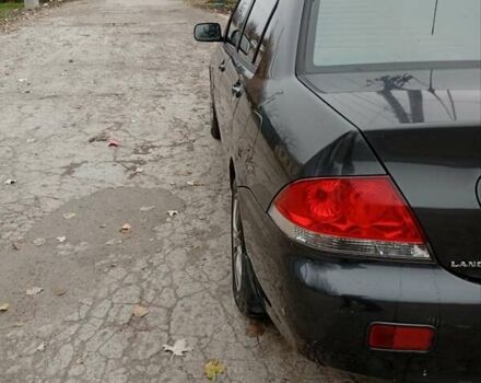 Серый Мицубиси Лансер, объемом двигателя 1.6 л и пробегом 372 тыс. км за 3500 $, фото 2 на Automoto.ua