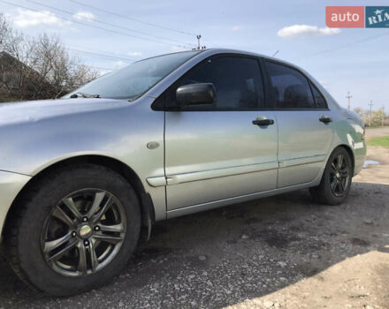 Мицубиси Лансер 2004 в Днепре (Днепропетровске) на Automoto.ua Серый Мицубиси Лансер, объемом двигателя 1.59 л и пробегом 294 тыс. км за 4699 $, фото 2 на Automoto.ua