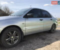 Мицубиси Лансер 2004 в Днепре (Днепропетровске) на Automoto.ua Серый Мицубиси Лансер, объемом двигателя 1.59 л и пробегом 294 тыс. км за 4699 $, фото 2 на Automoto.ua