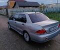 Мицубиси Лансер 2004 в Черновцах на Automoto.ua Серый Мицубиси Лансер, объемом двигателя 1.58 л и пробегом 439 тыс. км за 2750 $, фото 18 на Automoto.ua