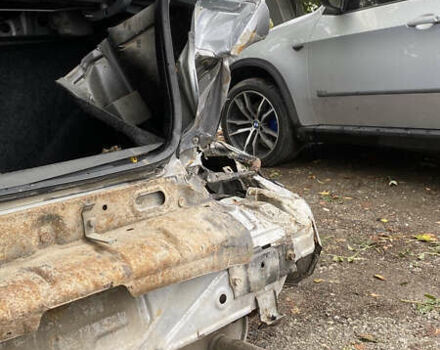 Сірий Міцубісі Lancer, об'ємом двигуна 1.58 л та пробігом 270 тис. км за 1999 $, фото 19 на Automoto.ua
