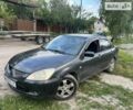 Сірий Міцубісі Lancer, об'ємом двигуна 1.58 л та пробігом 230 тис. км за 3500 $, фото 3 на Automoto.ua