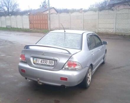 Серый Мицубиси Лансер, объемом двигателя 2 л и пробегом 300 тыс. км за 2850 $, фото 7 на Automoto.ua