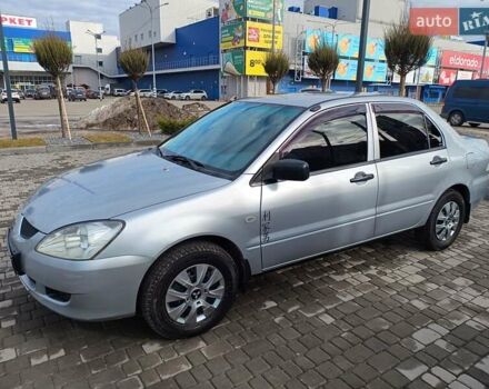 Серый Мицубиси Лансер, объемом двигателя 1.3 л и пробегом 230 тыс. км за 3900 $, фото 3 на Automoto.ua